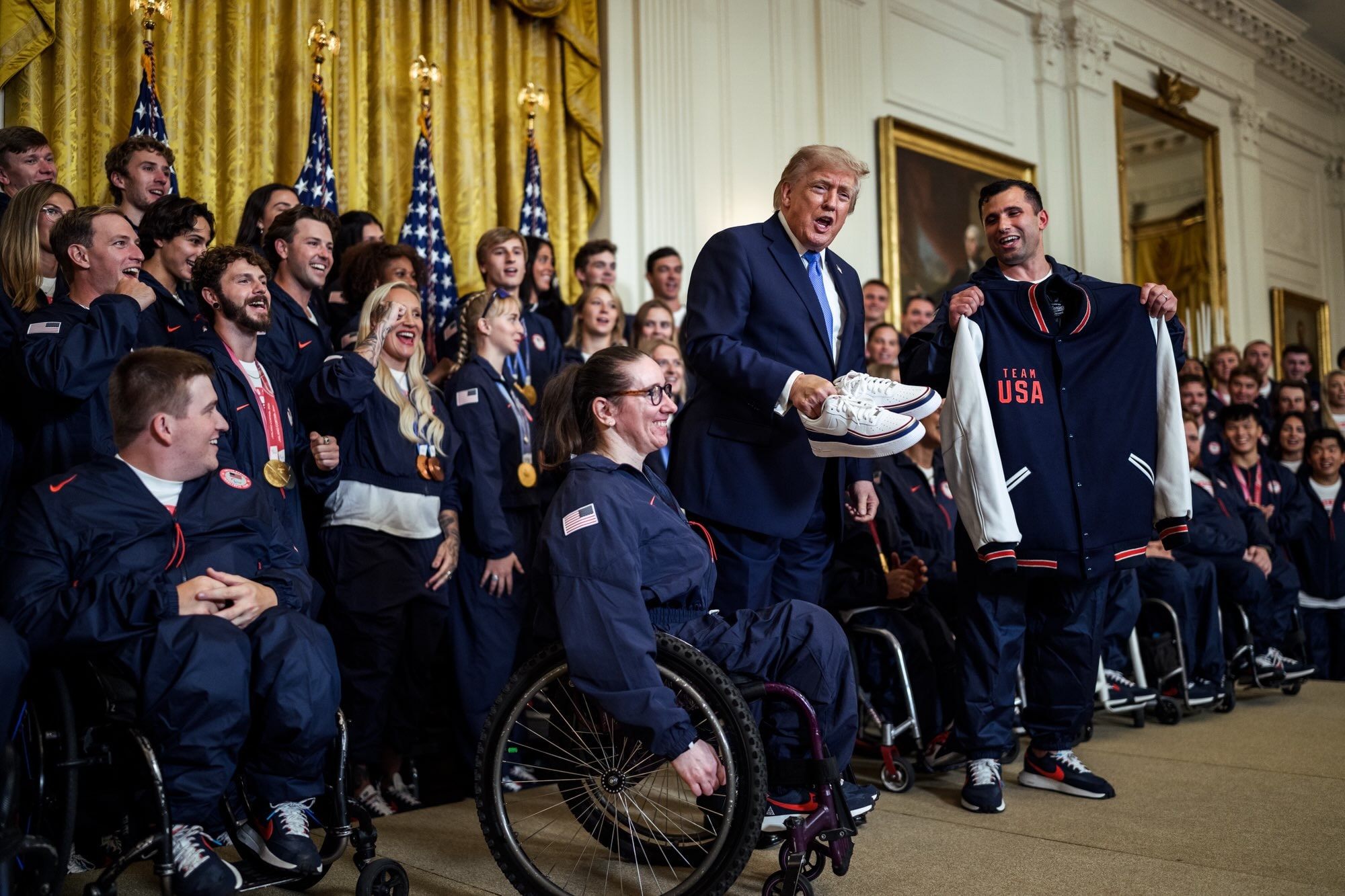 Pics - Trump receives sneakers from Paralympian