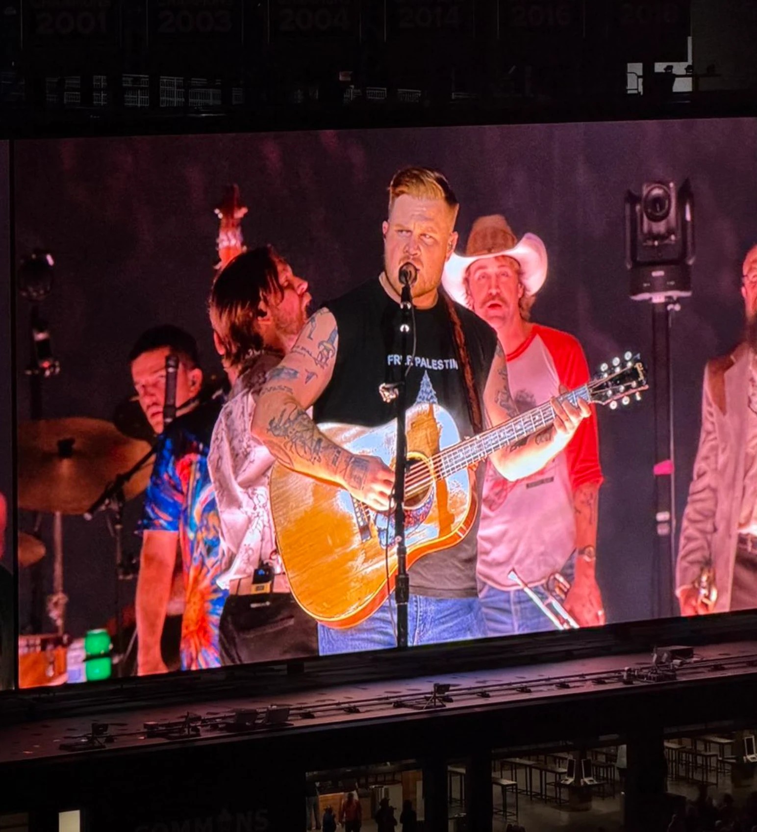 Zach Bryan declares himself a faggot and wears a Free Palestine shirt at his concert preview image