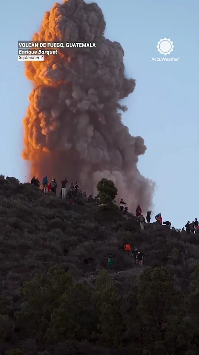 Hikers watch a volcano erupt preview image