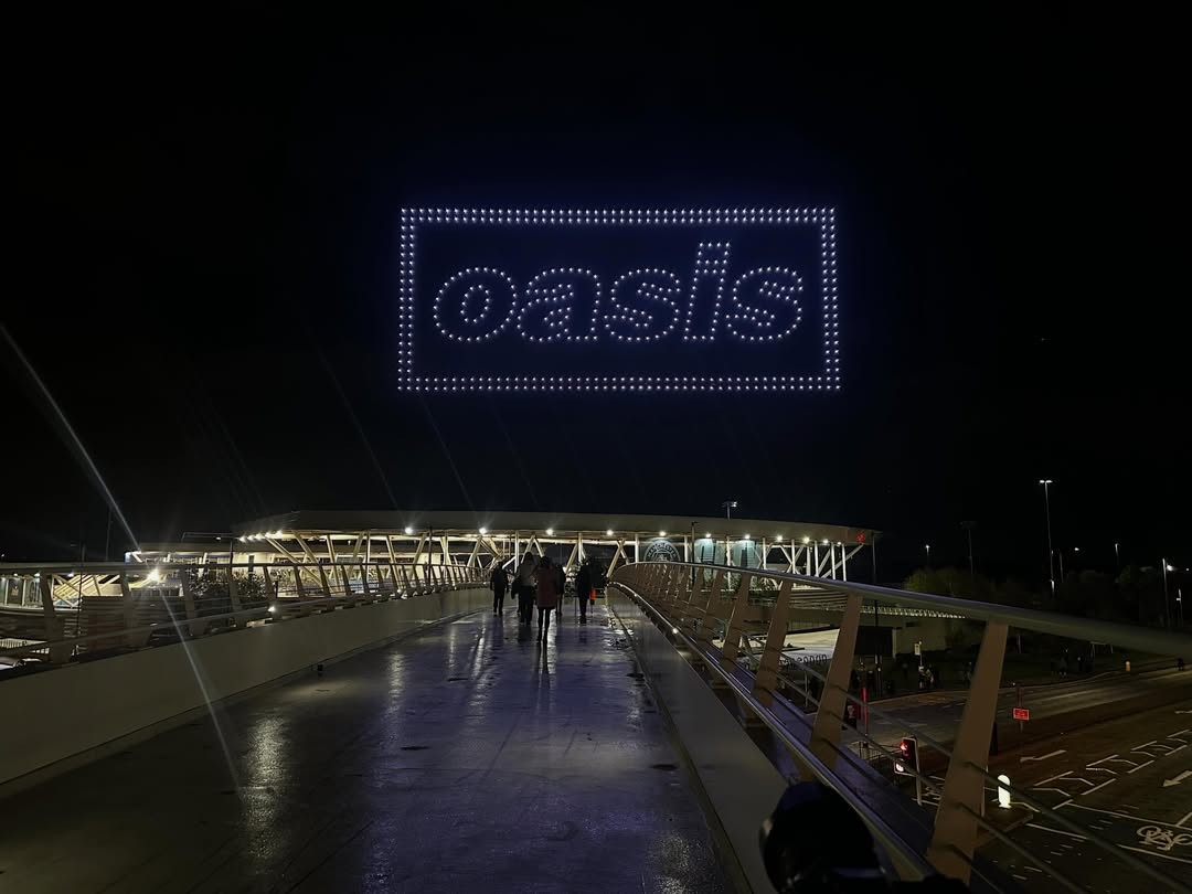 Music - Oasis teases 2027 tour with a drones over Manchester