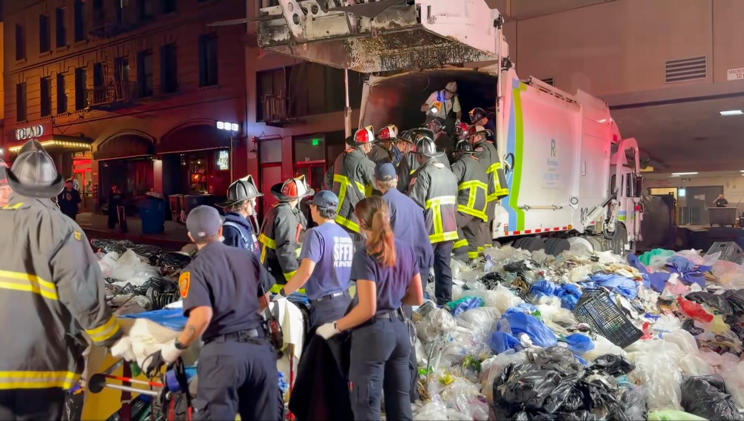 Pics - Man trapped in garbage truck rescued by Firefighters in San Francisco