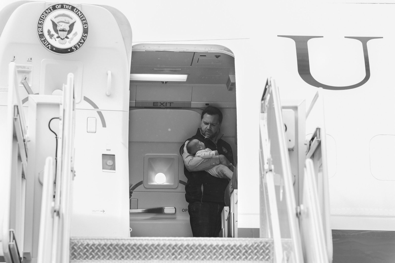 JD Vance with his newborn son on Air Force Two preview image