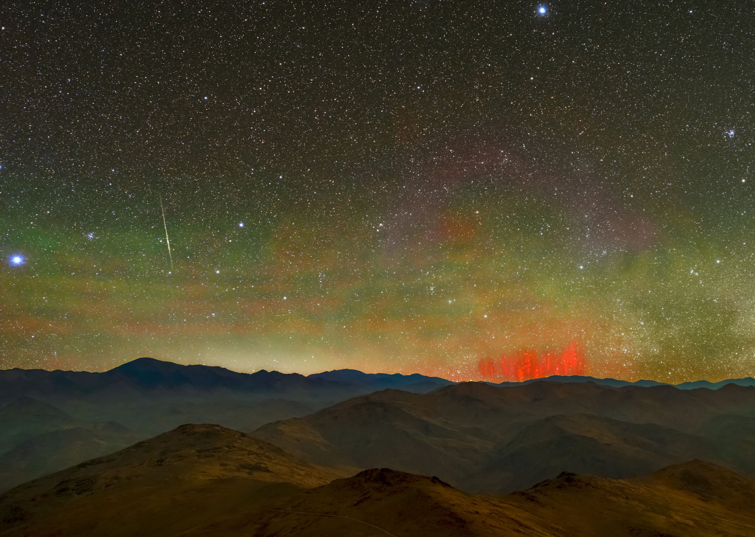 InterestingAF - Red sprites above a distant storm, seen from Chile's La Silla Observatory