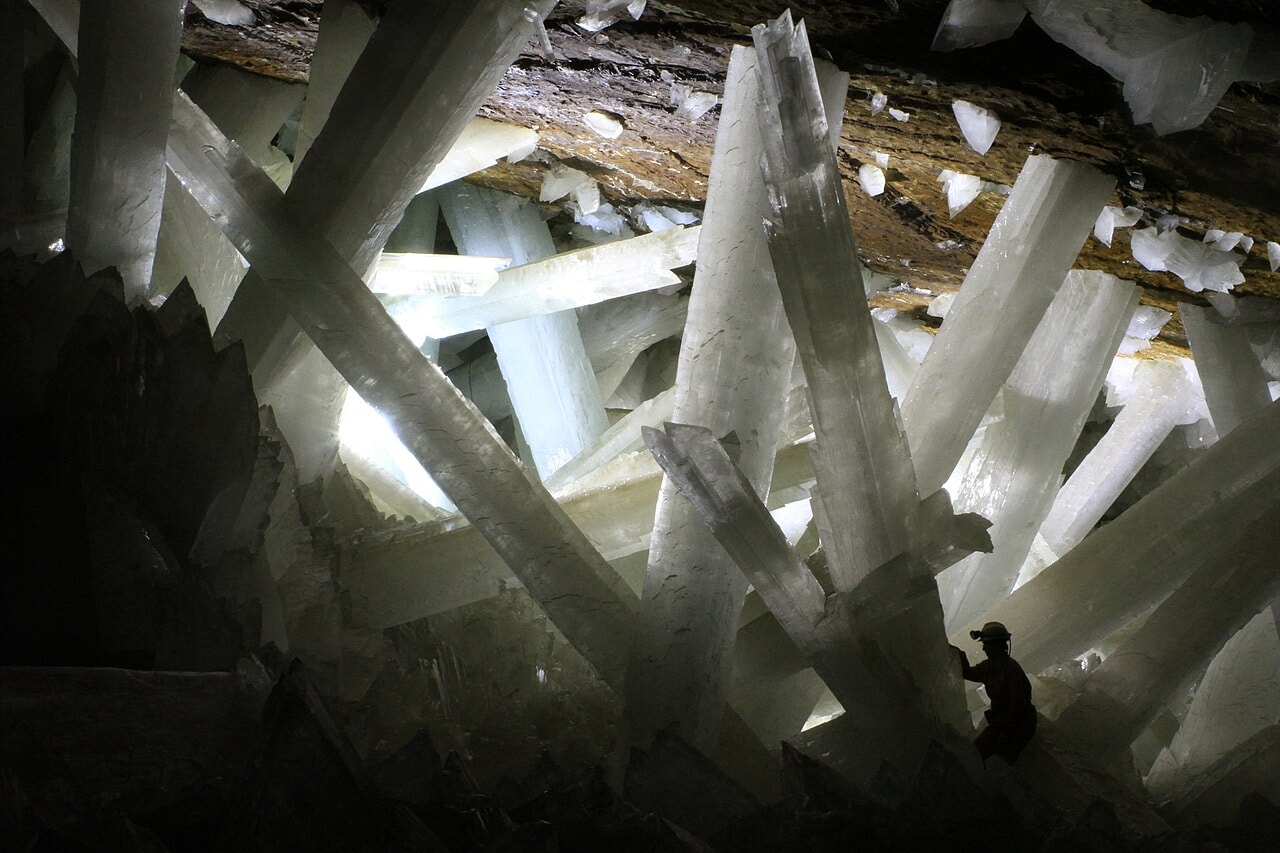 A person standing among the giant gypsum crystals inside Mexico's Naica mine preview image
